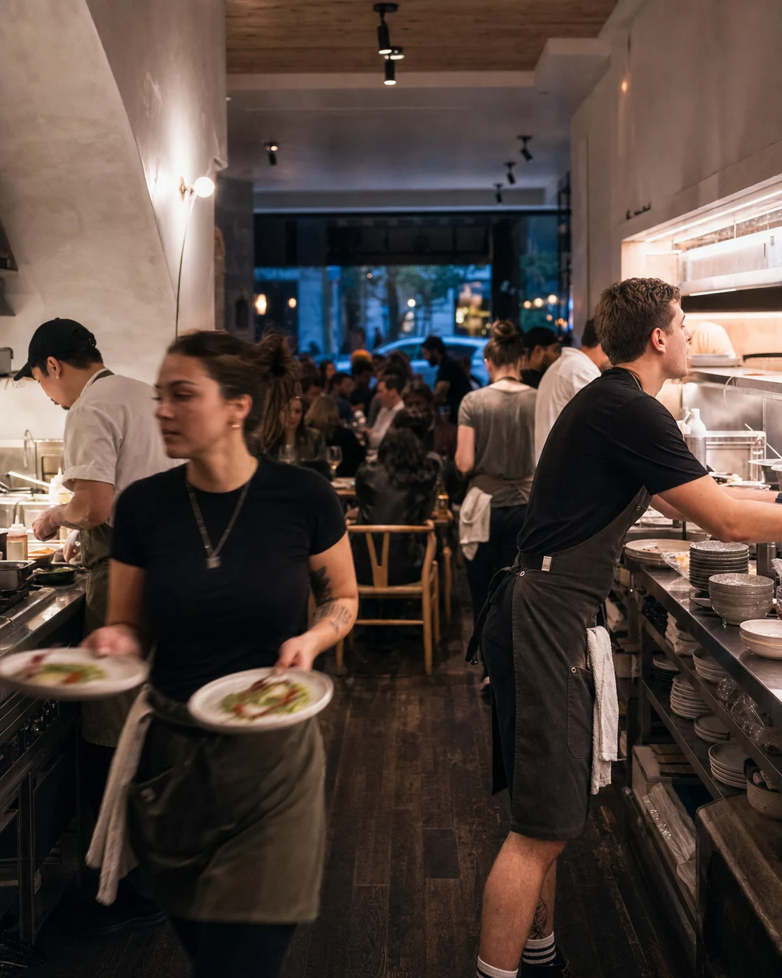 Service under way in a restaurant dining room on a Friday night