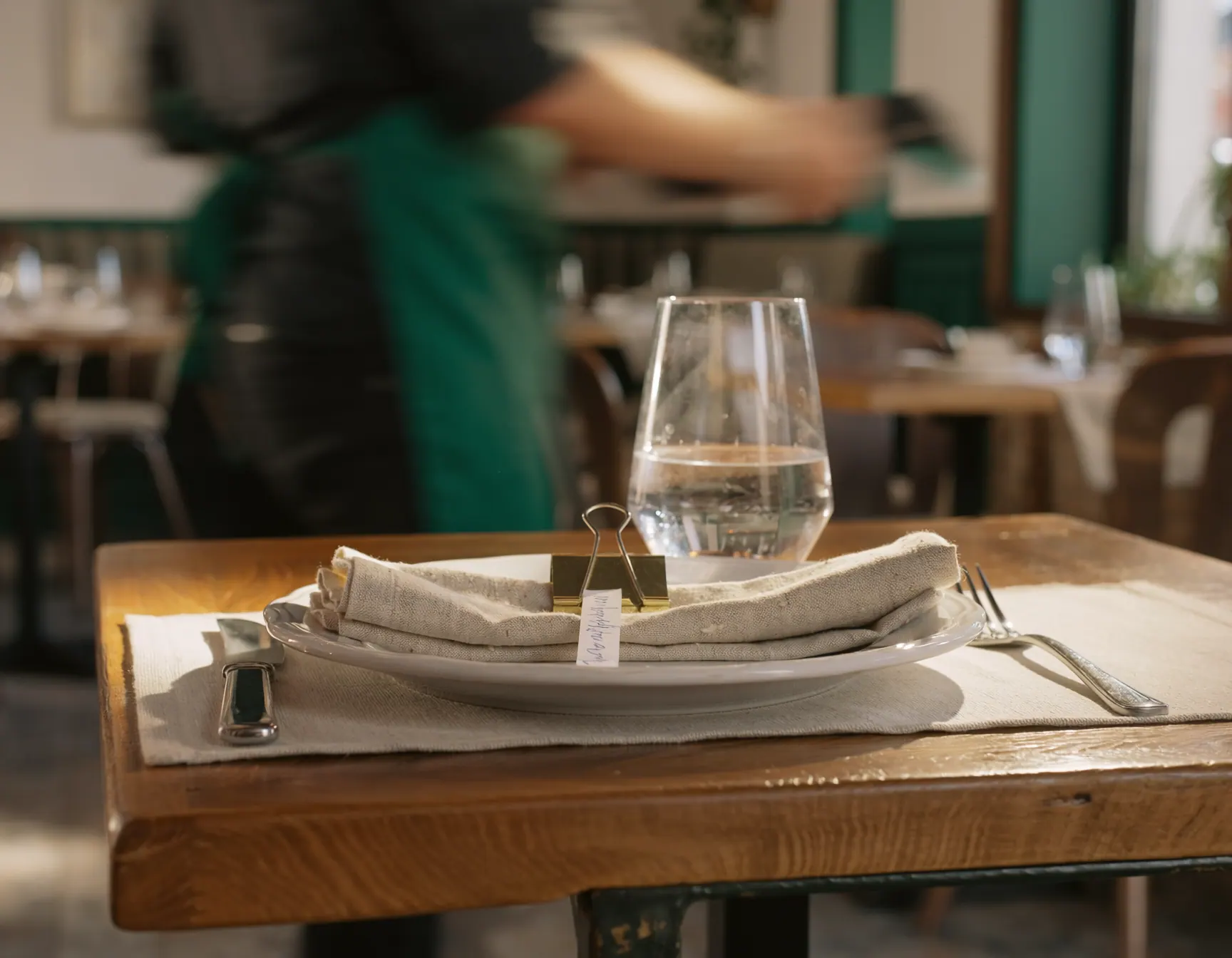 Prepared place setting with a dietary preference note