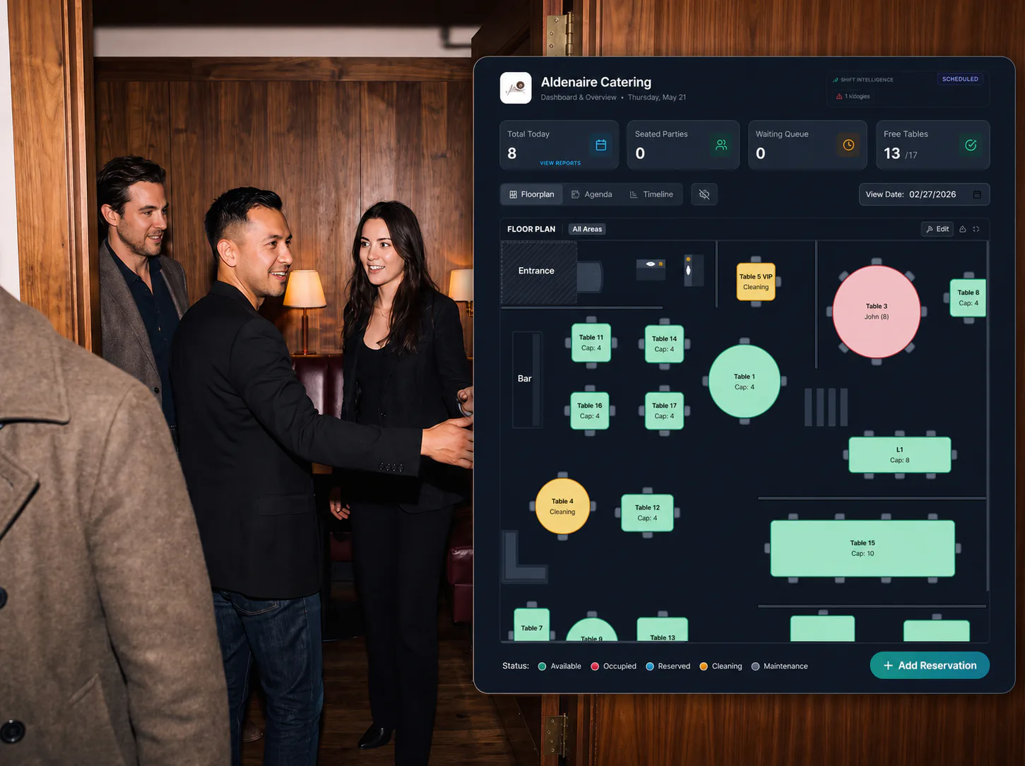 Restaurant host welcoming arriving guests with a prominent Dashi reservation floor plan overlay